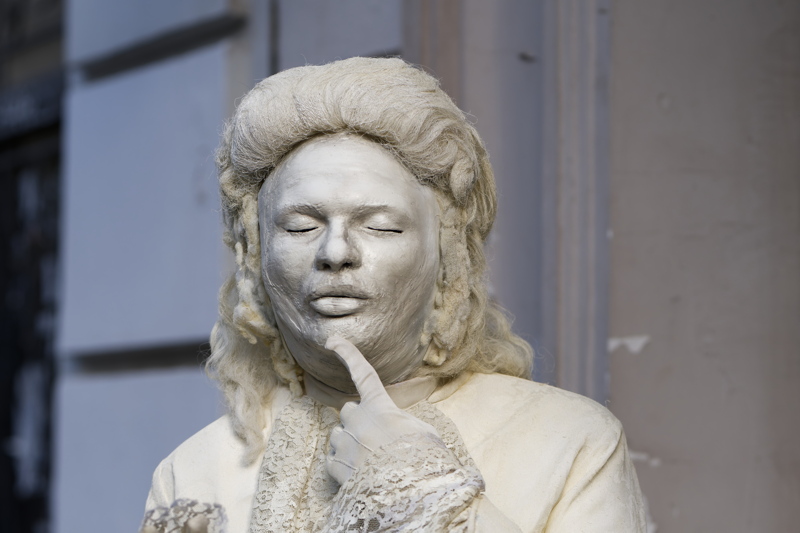 4 - A living statue performance artist dressed in historical attire